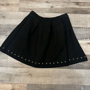 Blue Rain Black faux suede mini skirt with grommet detail sz M EUC